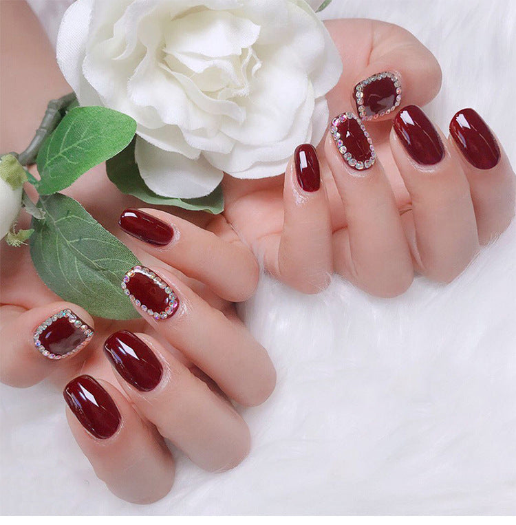 Glossy Red Nails with Rhinestones