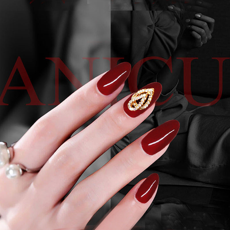 Cherry Red Super Glossy Nails with Golden Rhinetones